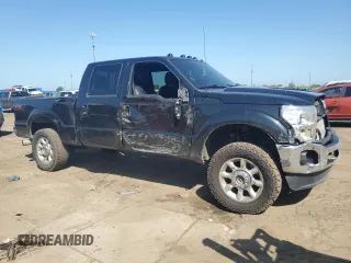2014 Ford F-350 XLT with VIN 1FT8W3BT5EEA52521, listed as a Copart auction lot 61803505 with 340,706 mi miles and Clean title. Bid and sale history available at DreamBid. Image 4.