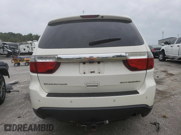2011 Dodge Durango Citadel with VIN 1D4RD5GG4BC711295, listed as a Copart auction lot 71058884 with 208,639 mi miles and Salvage title. Bid and sale history available at DreamBid. Image 6.