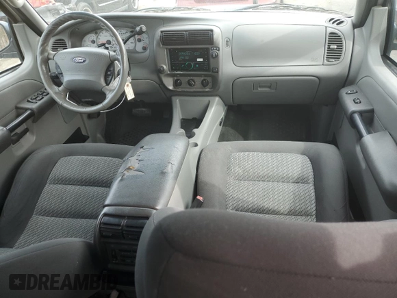 2003 Ford Explorer Sport Trac XLS with VIN 1FMZU67E33UA26245, listed as a Copart auction lot 47224405 with 113,009 mi miles and Salvage title. Bid and sale history available at DreamBid. Image 8.
