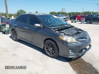 2011 Toyota Corolla L with VIN 2T1BU4EE8BC667772, listed as a IAAI auction lot 41960526 with 219,911 mi miles. Bid and sale history available at carsss.com. Image 1.