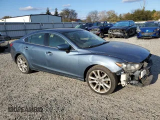 2014 Mazda 6 i Touring with VIN JM1GJ1V66E1137492, listed as a Copart auction lot 79632374 with 143,188 mi miles and Salvage Title. Bid and sale history available at DreamBid. Image 4.