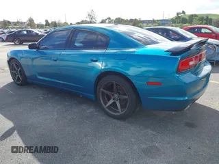 2012 Dodge Charger SXT with VIN 2C3CDXHG0CH185859, listed as a IAAI auction lot 40816799 with 132,572 mi miles. Bid and sale history available at carsss.com. Image 3.