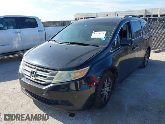 2012 Honda Odyssey EX-L z VIN 5FNRL5H63CB046447, wystawiony jako IAAI lot #42578775 z przebiegiem 247 852 mil mil oraz . Historia ofert i sprzedaży dostępna na DreamBid. Obrazek 2.