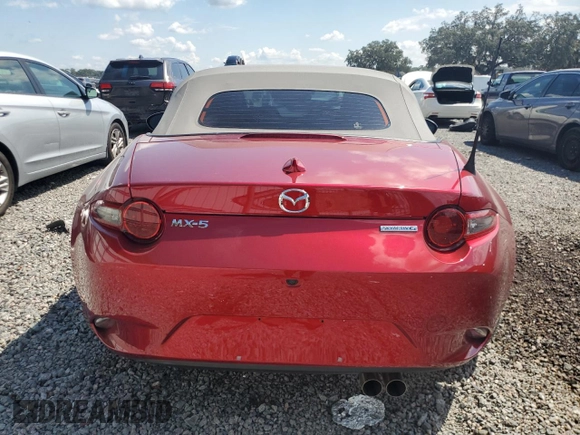 2020 Mazda MX-5 Miata Grand Touring z VIN JM1NDAD79L0415751, wystawiony jako Copart lot #71864574 z przebiegiem Nie podano mil oraz Szkoda całkowita • Salvage title. Historia ofert i sprzedaży dostępna na DreamBid. Obrazek 6.
