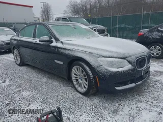 2014 BMW 7 Series 750i xDrive with VIN WBAYB6C56ED225091, listed as a IAAI auction lot 41718516 with 63,616 mi miles and . Bid and sale history available at DreamBid. Image 1.
