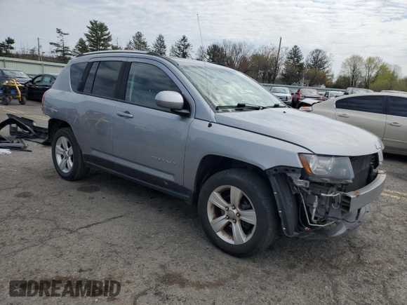 2014 Jeep Compass Latitude with VIN 1C4NJDEB4ED788348, listed as a Copart auction lot 52885935 with 86,282 mi miles and Salvage Title. Bid and sale history available at DreamBid. Image 4.