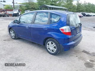 2009 Honda Fit with VIN JHMGE882X9S058976, listed as a IAAI auction lot 42202305 with 121,633 mi miles and . Bid and sale history available at DreamBid. Image 3.