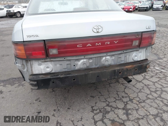 1994 Toyota Camry LE with VIN JT2SK12E2R0207688, listed as a IAAI auction lot 41323827 with 162,680 mi miles. Bid and sale history available at carsss.com. Image 6.