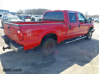 2012 Ford Super Duty F-250 SRW XL with VIN 1FT7W2B62CEB05477, listed as a IAAI auction lot 41973239 with 144,741 mi miles. Bid and sale history available at carsss.com. Image 4.