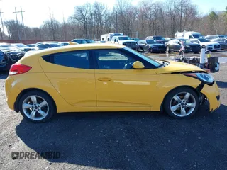 2012 Hyundai Veloster w/Black Int with VIN KMHTC6ADXCU042788, listed as a IAAI auction lot 41854662 with 90,500 mi miles. Bid and sale history available at carsss.com. Image 13.