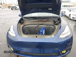 2022 Tesla Model Y Long Range with VIN 7SAYGDEE7NF409294, listed as a IAAI auction lot 41845261 with 73,116 mi miles and . Bid and sale history available at DreamBid. Image 10.