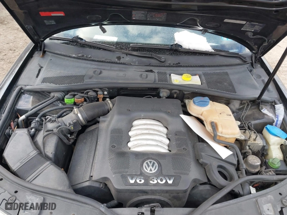 2003 Volkswagen Passat GLX with VIN WVWYH63B23E073924, listed as a IAAI auction lot 41447079 with 160,263 mi miles. Bid and sale history available at carsss.com. Image 10.
