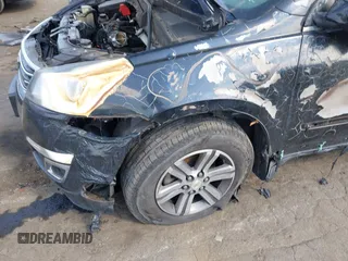 2016 Chevrolet Traverse LT z VIN 1GNKRHKD9GJ324797, wystawiony jako IAAI lot #41891336 z przebiegiem 132 234 mil mil oraz . Historia ofert i sprzedaży dostępna na DreamBid. Obrazek 13.