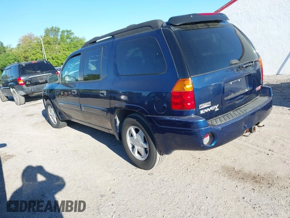 2003 GMC Envoy SLT z VIN 1GKET16S736233956, wystawiony jako IAAI lot #41844351 z przebiegiem 244 942 mil mil oraz . Historia ofert i sprzedaży dostępna na DreamBid. Obrazek 3.