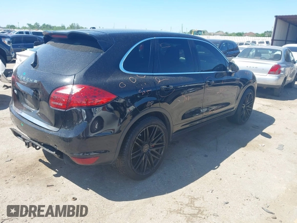2014 Porsche Cayenne Turbo S E-Hybrid z VIN WP1AA2A24ELA07504, wystawiony jako IAAI lot #41967592 z przebiegiem 114 308 mil mil oraz . Historia ofert i sprzedaży dostępna na DreamBid. Obrazek 4.