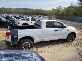 2010 Toyota Tundra 4WD Truck with VIN 5TFUY5F1XAX123787, listed as a Copart auction lot 54447555 with 242,821 mi miles and Clean Title. Bid and sale history available at carsss.com. Image 3.