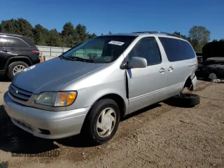 2002 Toyota Sienna LE with VIN 4T3ZF13C52U504138, listed as a Copart auction lot 74633984 with 154,406 mi miles and Salvage Title. Bid and sale history available at carsss.com. Image 1.