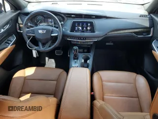 2020 Cadillac XT4 FWD Sport with VIN 1GYFZER48LF012489, listed as a Copart auction lot 54434025 with 74,249 mi miles and Salvage title. Bid and sale history available at DreamBid. Image 8.