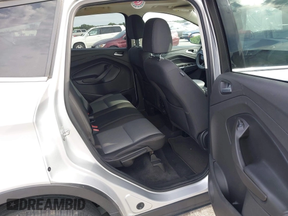 2017 Ford Escape SE with VIN 1FMCU0G90HUC81240, listed as a IAAI auction lot 40607814 with 68,333 mi miles and . Bid and sale history available at DreamBid. Image 8.