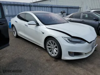 2017 Tesla Model S 100D with VIN 5YJSA1E24HF186757, listed as a Copart auction lot 51511745 with 242,779 mi miles and Salvage Title. Bid and sale history available at carsss.com. Image 4.