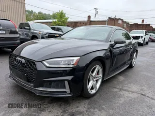2018 Audi S5 Premium Plus with VIN WAUP4AF59JA077177, listed as a IAAI auction lot 42218794 with 86,654 mi miles and . Bid and sale history available at DreamBid. Image 2.
