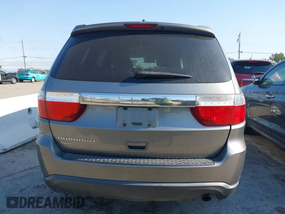 2012 Dodge Durango SXT with VIN 1C4RDJAG2CC271772, listed as a IAAI auction lot 42760810 with 151,215 mi miles and . Bid and sale history available at DreamBid. Image 16.