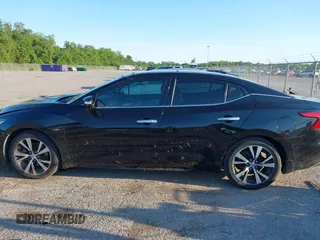 2018 Nissan Maxima SL with VIN 1N4AA6AP3JC401046, listed as a IAAI auction lot 42144400 with 86,330 mi miles and . Bid and sale history available at DreamBid. Image 14.