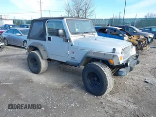 2003 Jeep Wrangler X with VIN 1J4FA39S33P363153, listed as a IAAI auction lot 41584805 with 160,676 mi miles. Bid and sale history available at carsss.com. Image 1.