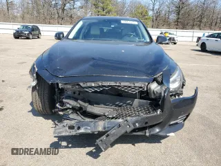 2015 Infiniti Q50 Premium with VIN JN1BV7ARXFM406453, listed as a Copart auction lot 54661515 with 77,298 mi miles and Salvage Title. Bid and sale history available at carsss.com. Image 5.