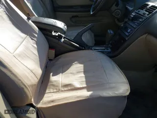 2000 Nissan Maxima GXE with VIN JN1CA31DXYT509314, listed as a IAAI auction lot 41762697 with 282,425 mi miles. Bid and sale history available at carsss.com. Image 5.