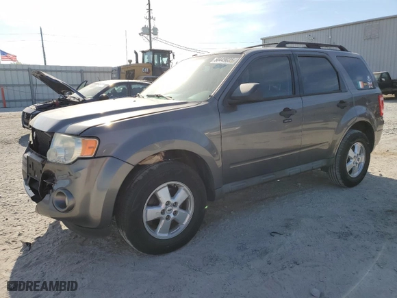2010 Ford Escape XLT with VIN 1FMCU0DG6AKD05058, listed as a Copart auction lot 50449035 with 127,781 mi miles and Salvage Title. Bid and sale history available at carsss.com. Image 1.