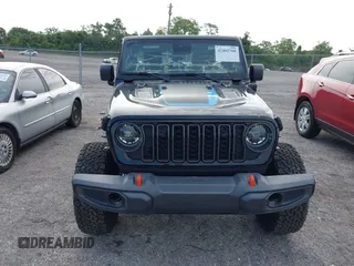 2024 Jeep Wrangler Rubicon X z VIN 1C4RJXR64RW197186, wystawiony jako IAAI lot #42405700 z przebiegiem 6 397 mil mil oraz . Historia ofert i sprzedaży dostępna na DreamBid. Obrazek 12.
