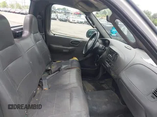 2004 Ford F-150 XL with VIN 2FTRF17W84CA35714, listed as a IAAI auction lot 42610810 with 129,865 mi miles and . Bid and sale history available at DreamBid. Image 5.