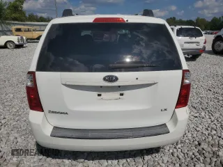 2006 Kia Sedona LX with VIN KNDMB233666057581, listed as a Copart auction lot 71027674 with 206,556 mi miles and Salvage Title. Bid and sale history available at carsss.com. Image 6.