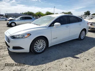 2014 Ford Fusion SE Hybrid with VIN 3FA6P0LU4ER318737, listed as a Copart auction lot 63575605 with 194,970 mi miles and Clean title. Bid and sale history available at DreamBid. Image 1.