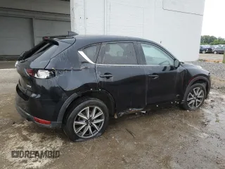 2018 Mazda CX-5 Touring z VIN JM3KFBCM4J0377280, wystawiony jako Copart lot #56688575 z przebiegiem 101 167 mil mil oraz Czysty tytuł • Clean title. Historia ofert i sprzedaży dostępna na DreamBid. Obrazek 3.