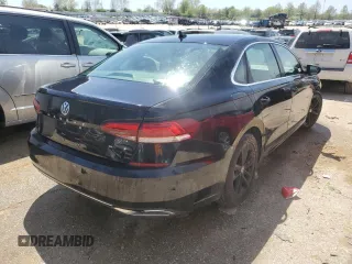 2020 Volkswagen Passat SE с VIN 1VWWA7A37LC018052, выставлен на аукционе Copart как лот 49409524 с пробегом 75 643 миль миль и Списание • Salvage title. История ставок и продаж доступна на DreamBid. Изображение 3.