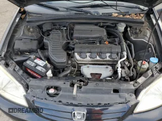 2001 Honda Civic LX with VIN 2HGES16571H607178, listed as a Copart auction lot 74284684 with 144,969 mi miles and Salvage Title. Bid and sale history available at carsss.com. Image 11.