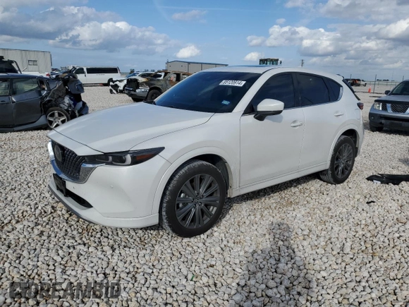 2024 Mazda CX-5 2.5 Turbo Signature with VIN JM3KFBXY7R0518304, listed as a Copart auction lot 42788985 with 8,593 mi miles and Salvage Title. Bid and sale history available at carsss.com. Image 1.