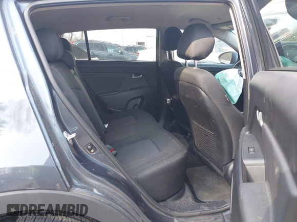 2013 Kia Sportage LX z VIN KNDPBCA2XD7428262, wystawiony jako IAAI lot #41793737 z przebiegiem 82 853 mil mil oraz . Historia ofert i sprzedaży dostępna na DreamBid. Obrazek 8.