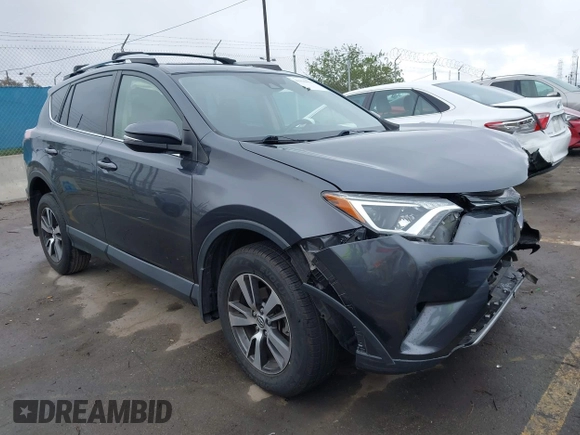 2017 Toyota RAV4 XLE with VIN JTMWFREV0HD094323, listed as a IAAI auction lot 41922013 with 71,601 mi miles. Bid and sale history available at carsss.com. Image 1.