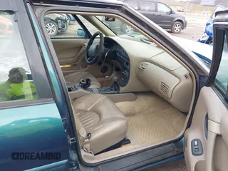 1996 Pontiac Bonneville z VIN 1G2HZ5210TH210829, wystawiony jako IAAI lot #41203888 z przebiegiem 154 990 mil mil oraz . Historia ofert i sprzedaży dostępna na DreamBid. Obrazek 5.