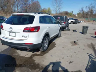 2015 Mazda CX-9 Touring with VIN JM3TB3CV9F0462931, listed as a IAAI auction lot 41912768 with 159,413 mi miles. Bid and sale history available at carsss.com. Image 4.