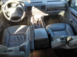 2000 Land Rover Discovery Cloth with VIN SALTY1241YA250907, listed as a Copart auction lot 81405614 with 95,310 mi miles and Salvage Title. Bid and sale history available at DreamBid. Image 8.