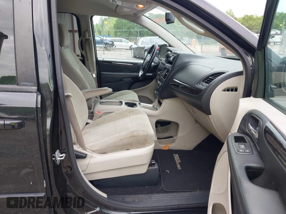 2013 Dodge Grand Caravan SXT with VIN 2C4RDGCG9DR599814, listed as a IAAI auction lot 42168424 with 173,413 mi miles and . Bid and sale history available at DreamBid. Image 5.