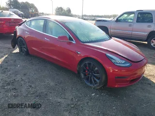 2020 Tesla Model 3 Performance z VIN 5YJ3E1EC3LF624856, wystawiony jako IAAI lot #41984470 z przebiegiem 49 842 mil mil oraz . Historia ofert i sprzedaży dostępna na DreamBid. Obrazek 1.