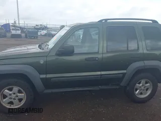 2006 Jeep Liberty Sport with VIN 1J4GL48K76W288408, listed as a IAAI auction lot 39990700 with 215,716 mi miles. Bid and sale history available at carsss.com. Image 14.