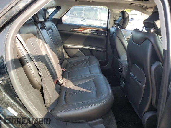 2014 Lincoln MKZ z VIN 3LN6L2J90ER802254, wystawiony jako Copart lot #58727025 z przebiegiem 172 297 mil mil oraz Szkoda całkowita • Salvage title. Historia ofert i sprzedaży dostępna na DreamBid. Obrazek 10.