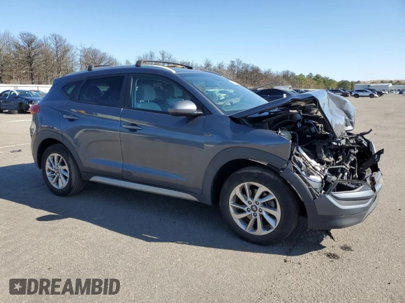 2017 Hyundai Tucson SE z VIN KM8J33A44HU376246, wystawiony jako Copart lot #52453345 z przebiegiem 97 306 mil mil oraz Szkoda całkowita • Salvage title. Historia ofert i sprzedaży dostępna na DreamBid. Obrazek 4.