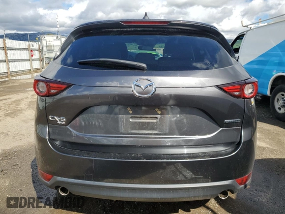 2020 Mazda CX-5 Grand Touring with VIN JM3KFBDM5L0737724, listed as a Copart auction lot 49209005 with 45,031 mi miles and Salvage Title. Bid and sale history available at carsss.com. Image 6.